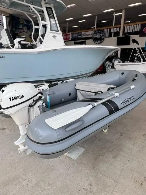 Slide: The Image of 2023 Highfield Ultralite 310 inflatable boat with Yamaha motor in showroom. - 4