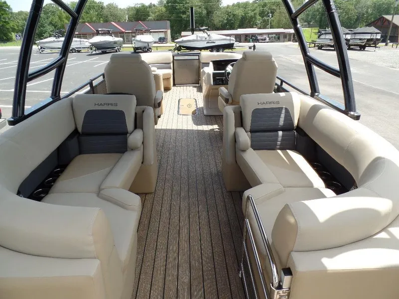 Slide: The Image of 2025 Harris Solstice 270 REC pontoon boat with luxurious seating and spacious deck. - 12
