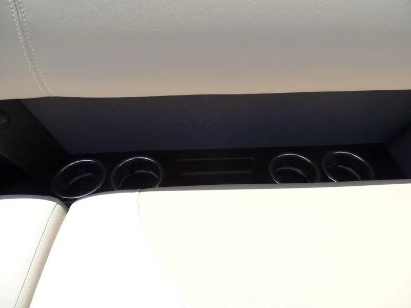 Slide: The Image of Cup holders on Harris Solstice 270 REC boat, 2025 model, with beige seating. - 6