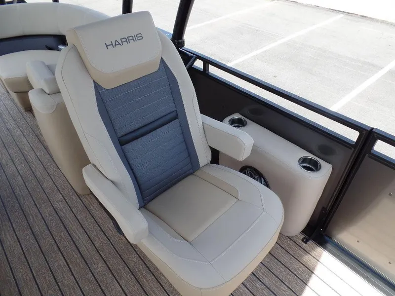 Slide: The Image of 2025 Harris Solstice 270 REC boat seat with cup holders on deck. - 8