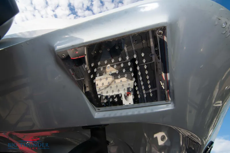 Slide: The Image of 2024 Glasstream 32 GSX boat hull detail with sky reflection. - 19