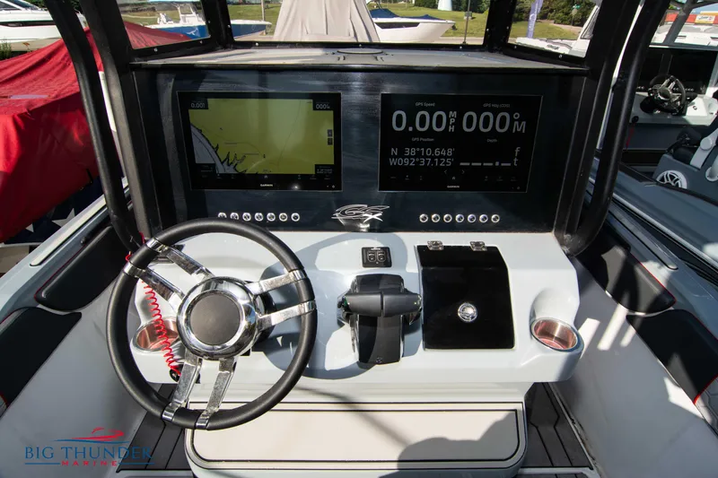 Slide: The Image of 2024 Glasstream 32 GSX boat dashboard with modern navigation and control systems. - 24