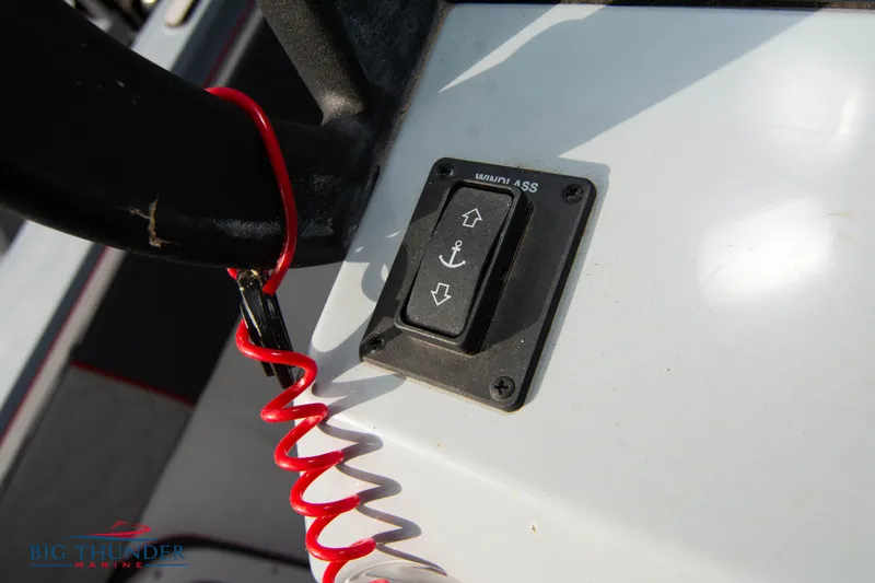 Slide: The Image of 2024 Glasstream 32 GSX anchor control panel with red safety cord. - 32