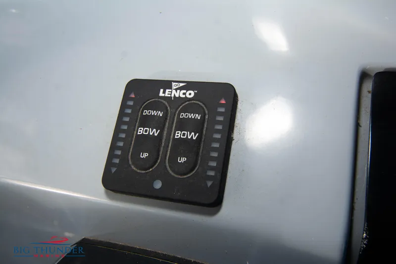 Slide: The Image of Lenco trim tab control panel on 2024 Glasstream 32 GSX boat. - 33
