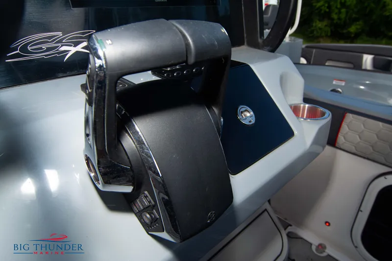 Slide: The Image of 2024 Glasstream 32 GSX throttle control in cockpit, featuring sleek design and modern technology. - 34