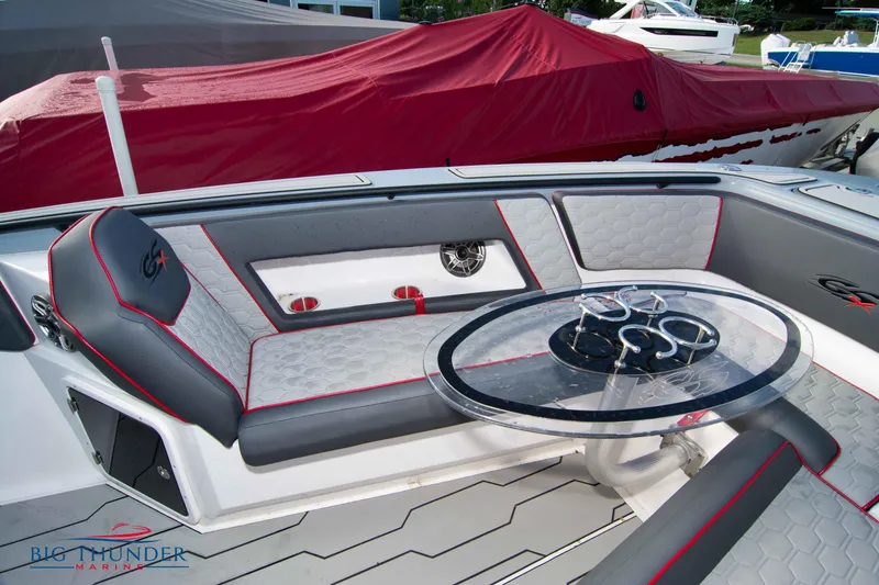 Slide: The Image of 2024 Glasstream 32 GSX boat interior with stylish seating and modern table design. - 45
