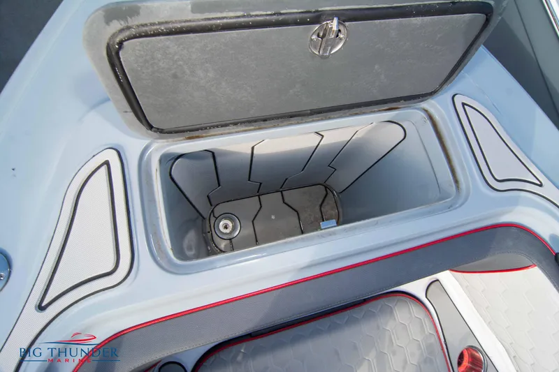 Slide: The Image of 2024 Glasstream 32 GSX boat storage compartment with sleek design and secure latch. - 47
