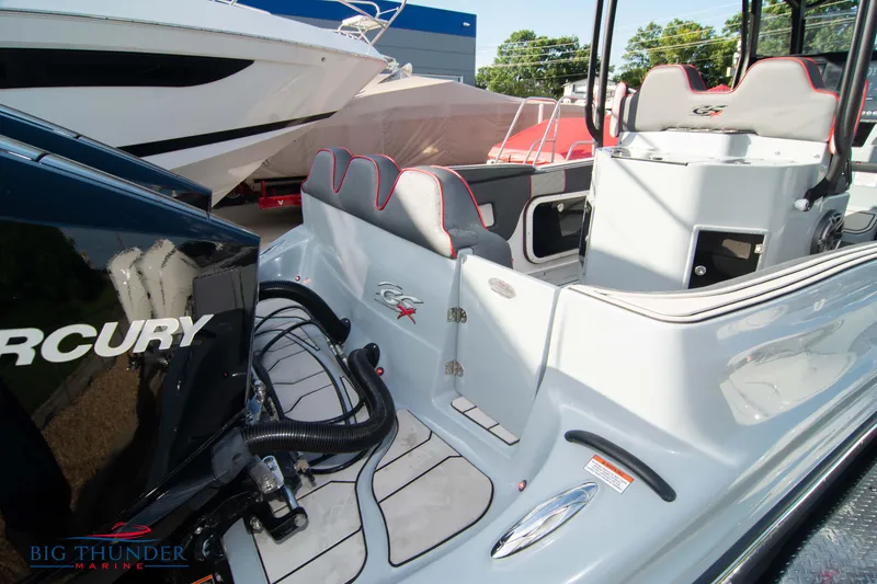 Slide: The Image of 2024 Glasstream 32 GSX boat interior with Mercury engine, sleek design, and modern seating. - 6