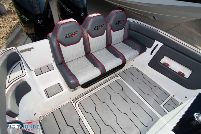 Slide: The Image of 2024 Glasstream 32 GSX boat interior with three cushioned seats and modern flooring. - 9