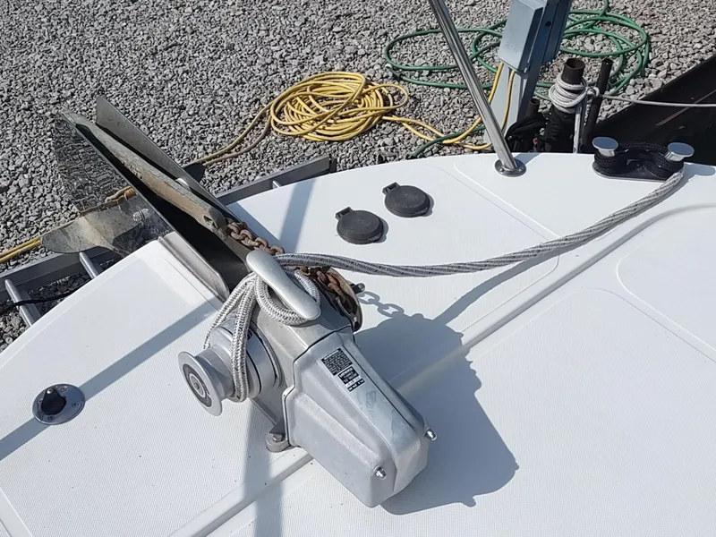 Slide: The Image of Anchor system on 2003 American Tug 34 boat deck with ropes and cables. - 2