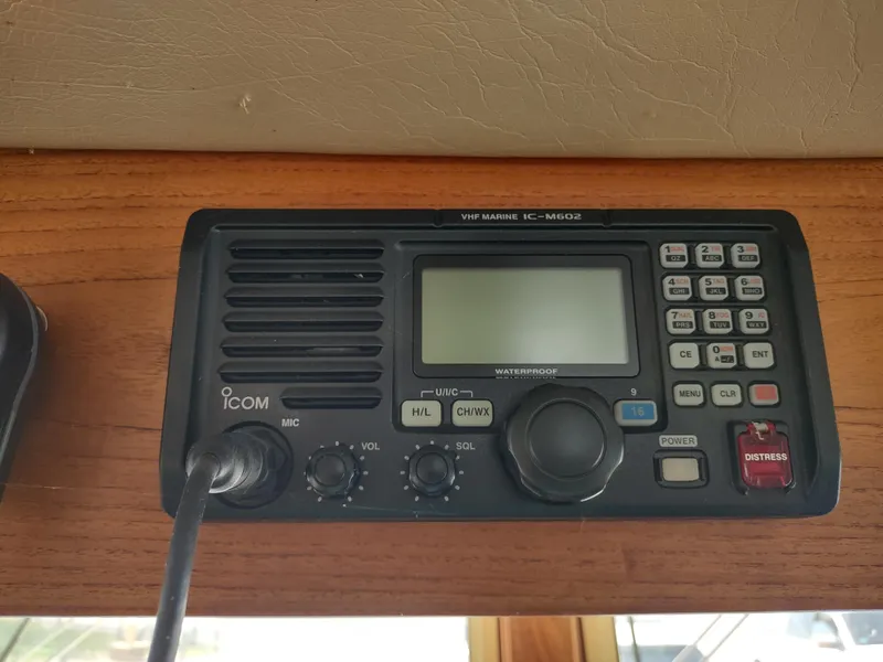 Slide: The Image of VHF marine radio on 2003 American Tug 34 boat dashboard. - 34