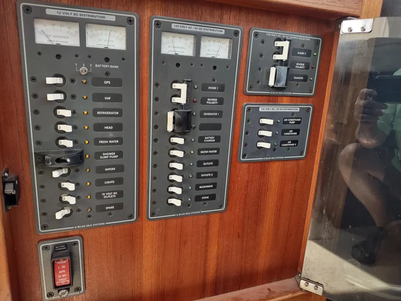 Slide: The Image of Electrical control panel on a 2003 American Tug 34 boat. - 39