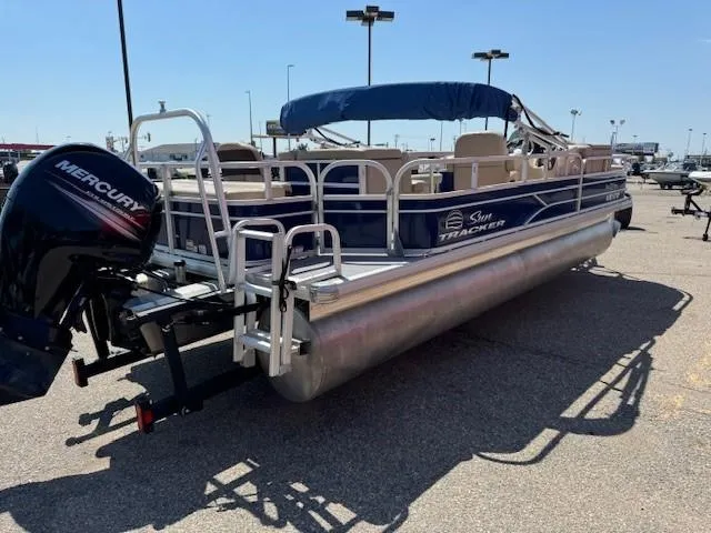 Slide: The Image of 2017 Sun Tracker Fishin' Barge 22 DLX pontoon boat with Mercury engine. - 3