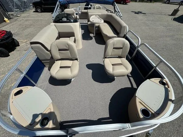 Slide: The Image of 2017 Sun Tracker Fishin' Barge 22 DLX with spacious seating and fishing amenities. - 7