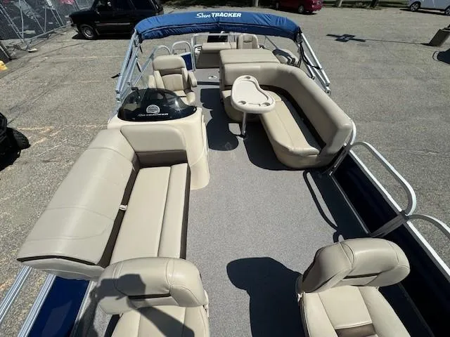 Slide: The Image of 2017 Sun Tracker Fishin' Barge 22 DLX with spacious seating and canopy. - 8