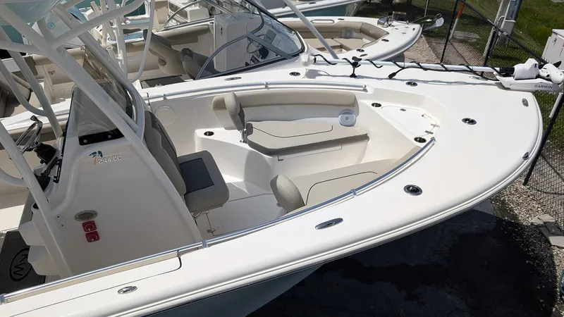 Slide: The Image of 2025 Key West 244 Center Console boat with spacious seating and modern design. - 7