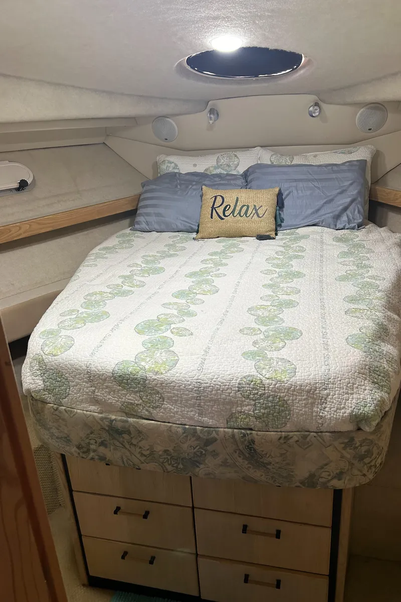 Slide: The Image of Cozy bedroom in 1997 Bayliner 3788 Command Bridge Motoryacht with "Relax" pillow. - 13