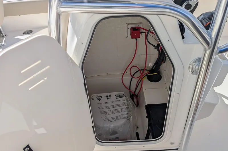 Slide: The Image of 2026 Key West 203 FS boat storage compartment with wiring and equipment. - 15