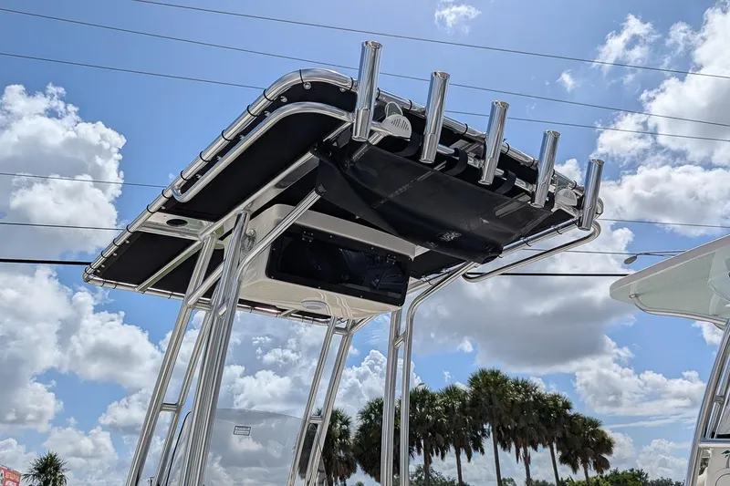 Slide: The Image of T-top of 2026 Key West 203 FS boat against a cloudy sky background. - 20