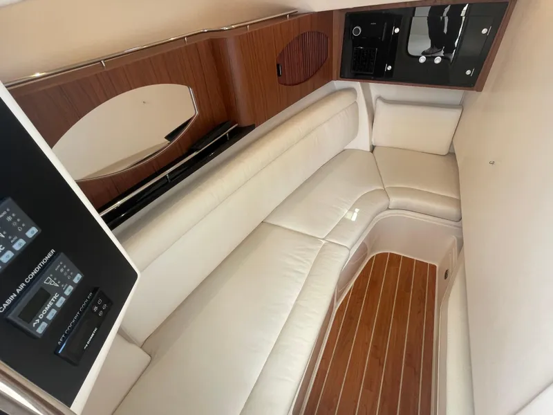 Slide: The Image of Garmin marine radio on 2023 Grady-White Freedom 335 boat dashboard. - 14