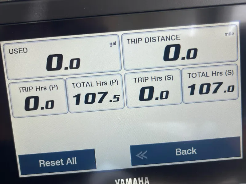 Slide: The Image of 2023 Grady-White Freedom 335 boat interior with helm and seating area. - 20