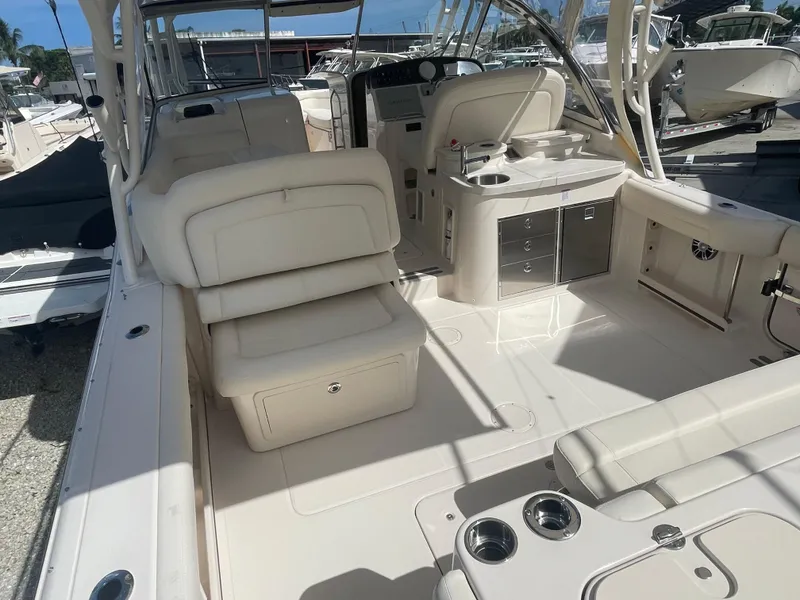 Slide: The Image of 2023 Grady-White Freedom 335 boat cockpit with Garmin navigation system. - 4