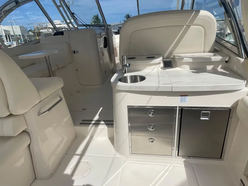 Slide: The Image of 2023 Grady-White Freedom 335 boat interior with luxurious seating and modern design. - 6