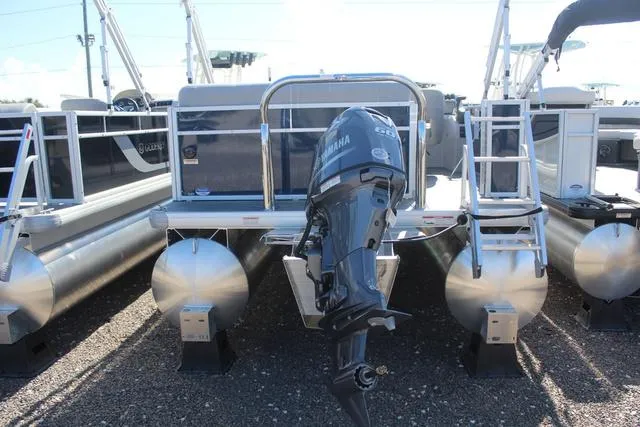 Slide: The Image of 2025 Godfrey Pontoons Xperience 1680 CX with Yamaha outboard motor, rear view. - 4