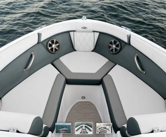 Slide: The Image of 2025 Regal 2000 ES boat interior with cushioned seating and speakers, on calm water. - 4