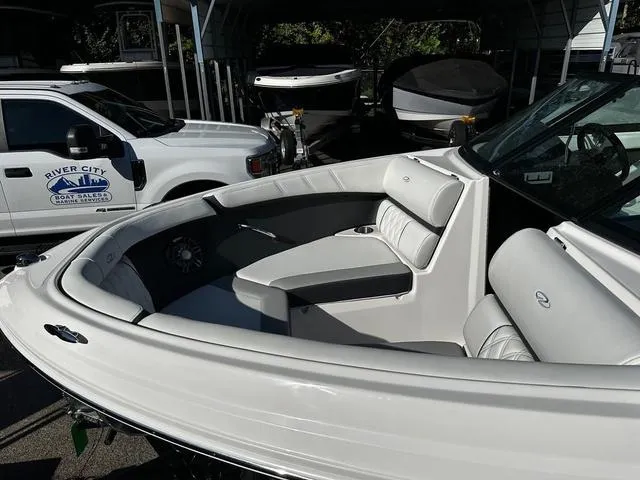 Slide: The Image of 2025 Regal 2000 ES boat with sleek white interior at River City Boat Sales. - 5