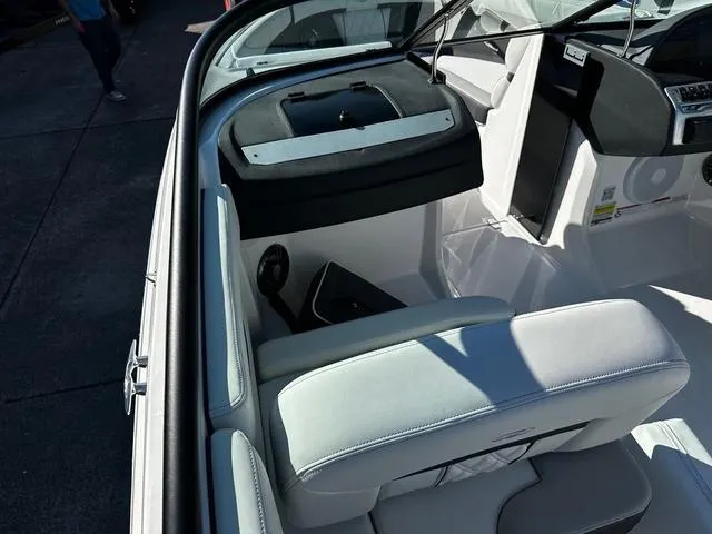 Slide: The Image of Interior of 2025 Regal 2000 ES boat, featuring sleek seating and modern dashboard. - 6