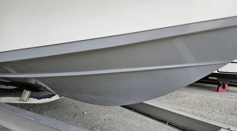 Slide: The Image of Close-up of 2020 Sea Pro 248 Bay boat hull on trailer. - 16