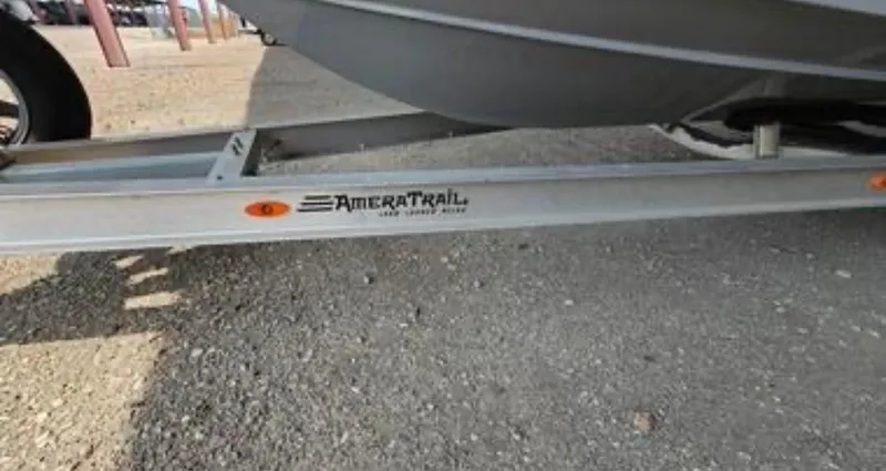 Slide: The Image of 2020 Sea Pro 248 Bay boat on AmeraTrail trailer, parked on gravel. - 28