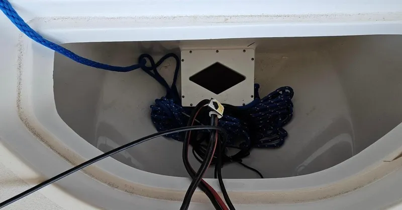 Slide: The Image of 2020 Sea Pro 248 Bay storage compartment with ropes and cables. - 30