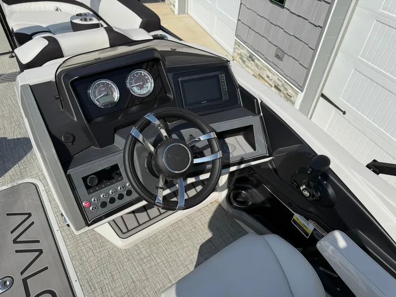 Slide: The Image of 2025 Avalon 2385 Catalina Quad Lounger dashboard with steering wheel and controls. - 22