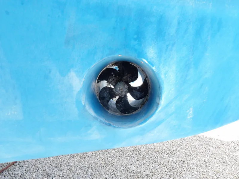 Slide: The Image of Close-up of a 1999 Mainship 350 Trawler's bow thruster in blue hull. - 6