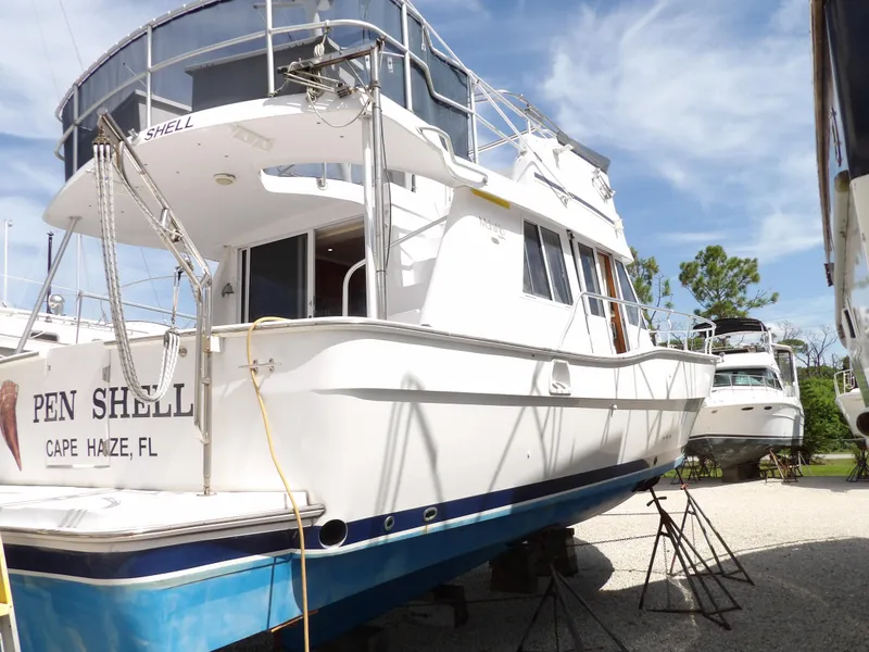 Slide: The Image of 1999 Mainship 350 Trawler on stands, Cape Haze, FL, sunny day. - 7