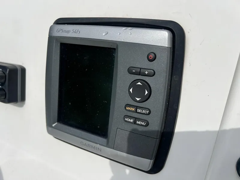 Slide: The Image of Garmin GPSmap 541s on 2009 Triton 220 LTS boat dashboard. - 13
