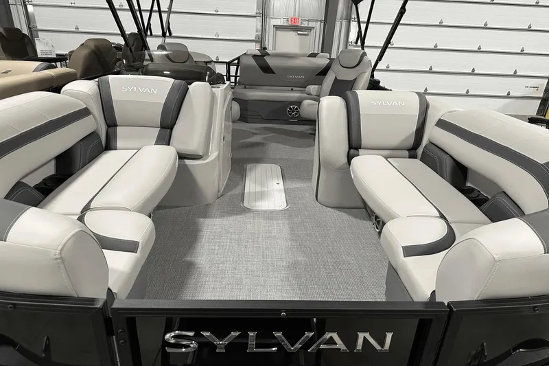 Slide: The Image of 2025 Sylvan L-5 boat interior with luxurious seating and modern design. - 11
