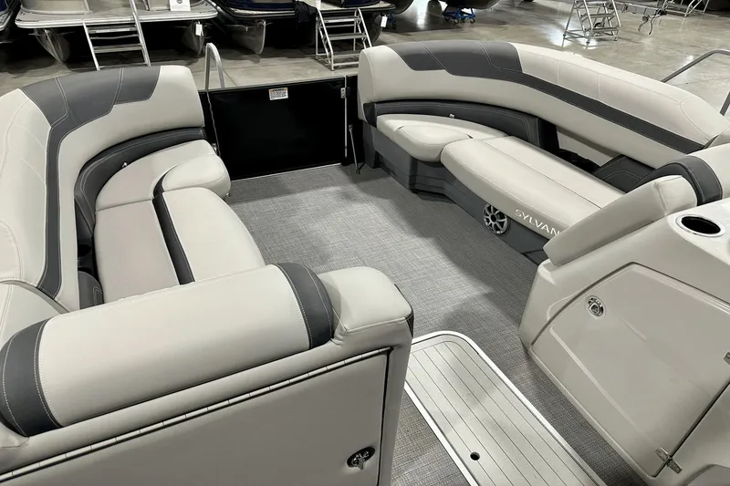 Slide: The Image of Luxurious interior of 2025 Sylvan L-5 boat with plush seating and modern design. - 14
