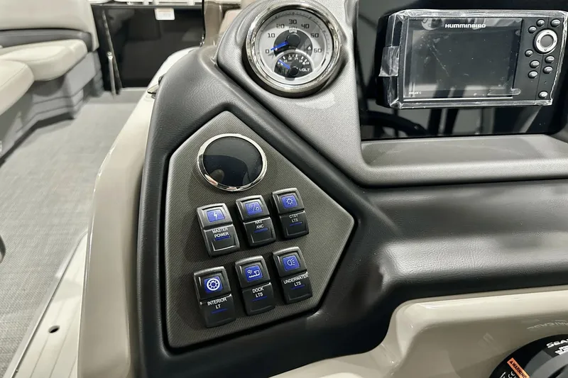 Slide: The Image of Control panel of a 2025 Sylvan L-5 boat with buttons and a display screen. - 19