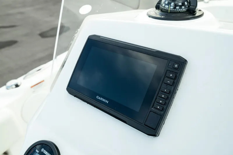 Slide: The Image of Garmin navigation system on 2023 Edgewater 188CC boat dashboard. - 11