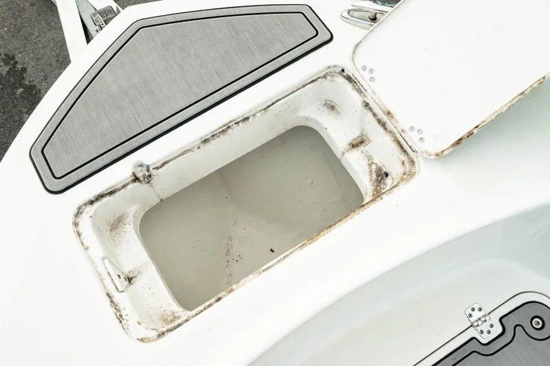 Slide: The Image of 2023 Edgewater 188CC boat storage compartment, open and empty. - 17
