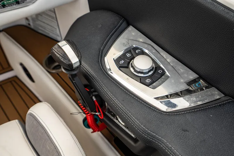Slide: The Image of Control panel of 2022 Nautique Super Air Nautique G23 boat interior. - 14