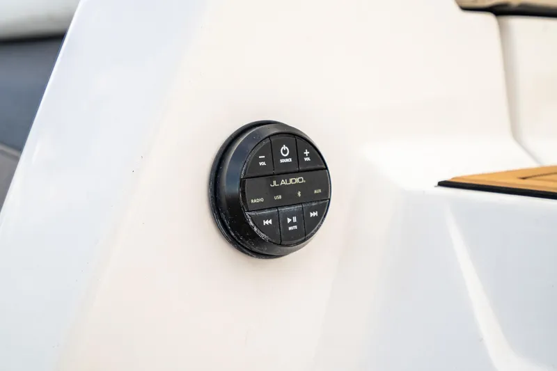 Slide: The Image of JL Audio control panel on 2022 Nautique Super Air Nautique G23 boat. - 36