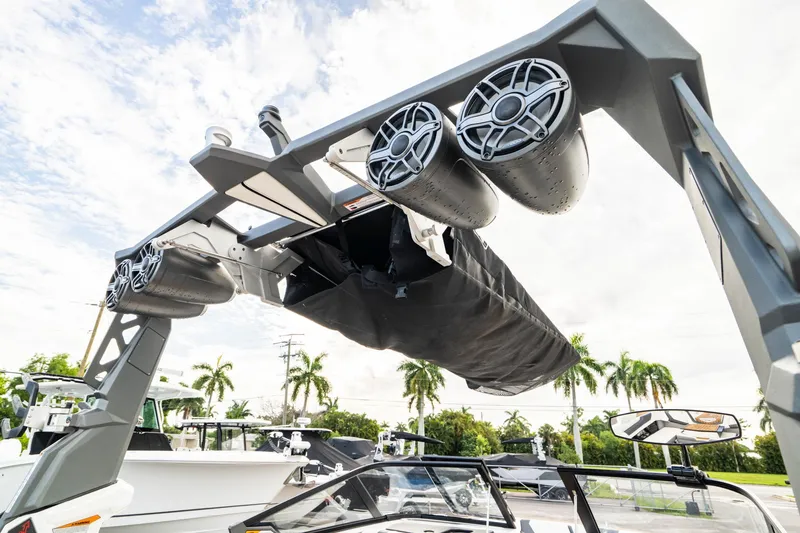 Slide: The Image of 2022 Nautique Super Air Nautique G23 boat with advanced sound system and sleek design. - 37