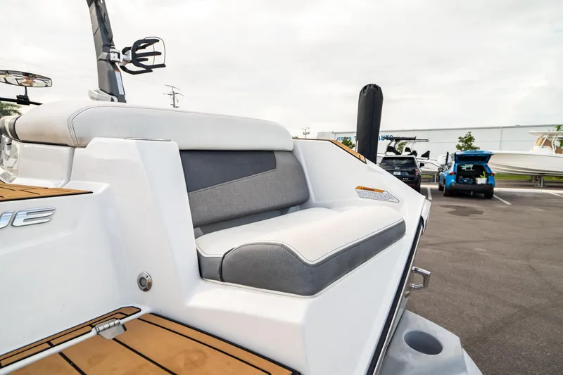 Slide: The Image of 2022 Nautique Super Air Nautique G23 boat with sleek seating and modern design. - 38