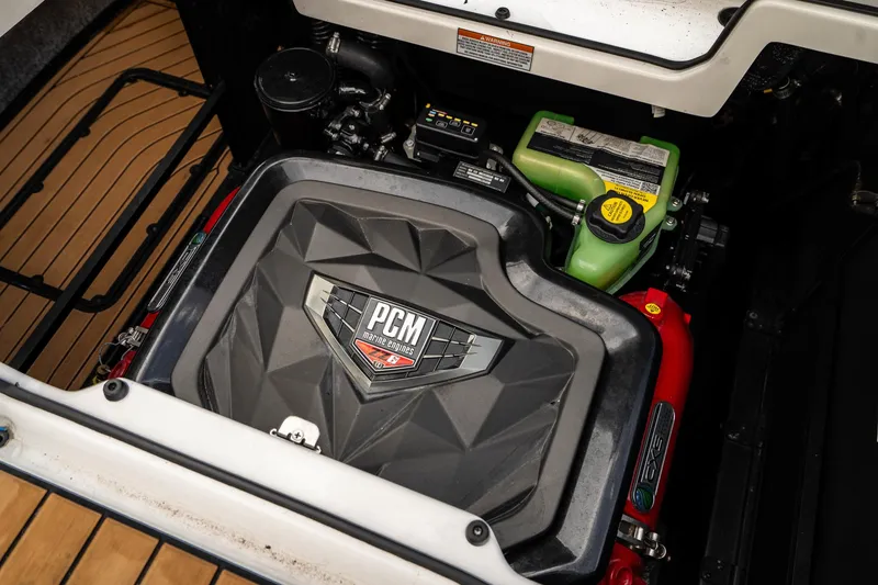 Slide: The Image of 2022 Nautique Super Air Nautique G23 engine compartment with PCM engine components. - 4