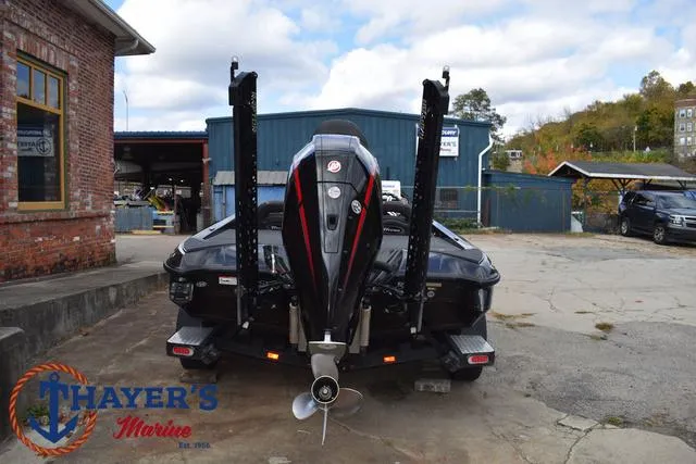 Slide: The Image of 2020 Triton 20 TRX Patriot boat at Thayer's Marine dealership. - 11