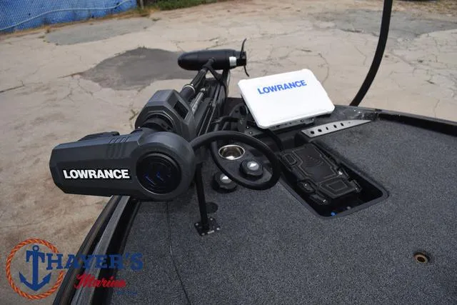 Slide: The Image of 2020 Triton 20 TRX Patriot boat with Lowrance electronics on deck. - 12